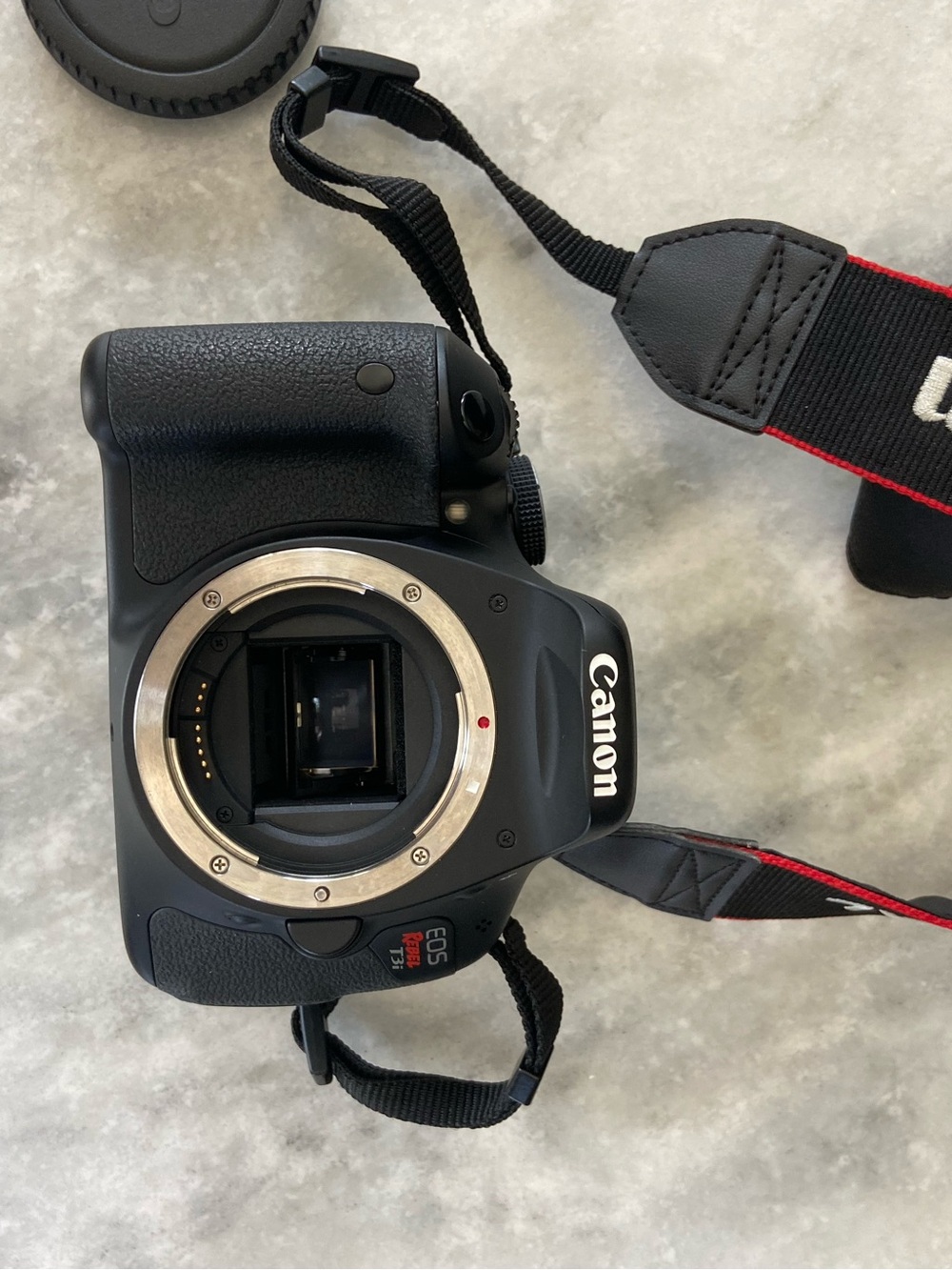 Canon DSLR Camera Body in Black with Red-Trim Strap